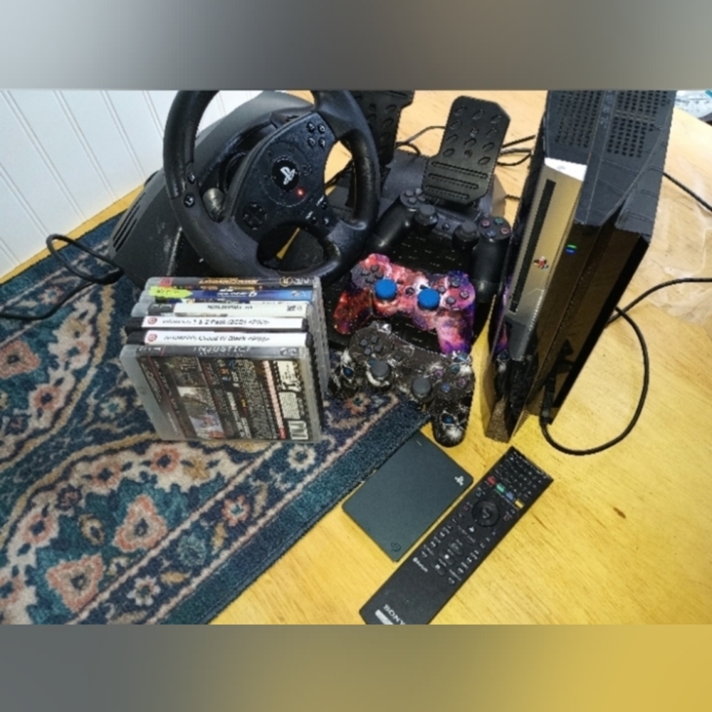 Playstation 3, steering pedals, games, and more.